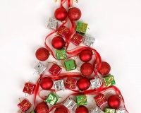 joyful holiday greetings,Christmas tree decoration made of baubles and ribbons,red and green Christmas decorations,