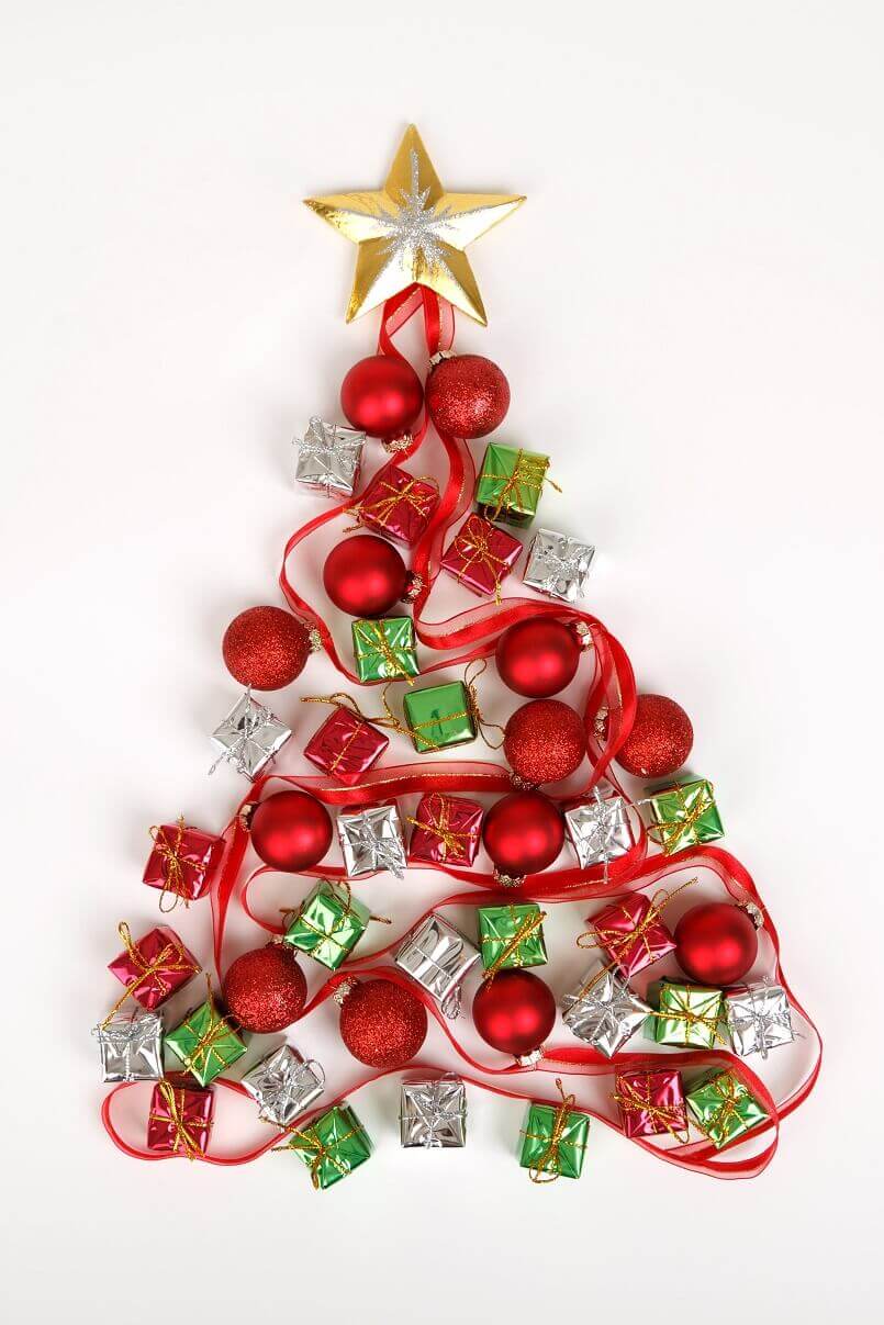 red and green Christmas decorations,joyful holiday greetings,Christmas tree decoration made of baubles and ribbons,