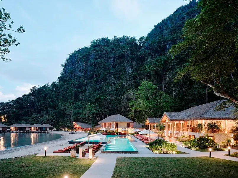 beach resort with a pool and traditional rustic houses, archi-living.com