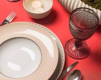 red and pink table settings,red glasses for wine,Christmas plates and bowls,elegant dinnerware collection,porcelain plates holiday,