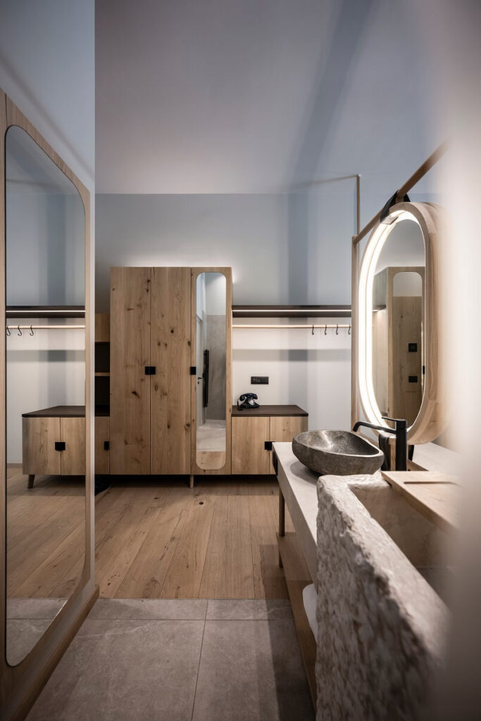 wood and stone bathroom designs,hotel olympic vigo di fassa,mountain hotel north italy