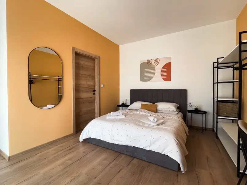 bedroom design with orange wall, holiday homes interior design by Maja Lončar Medić (ML Solutions)
