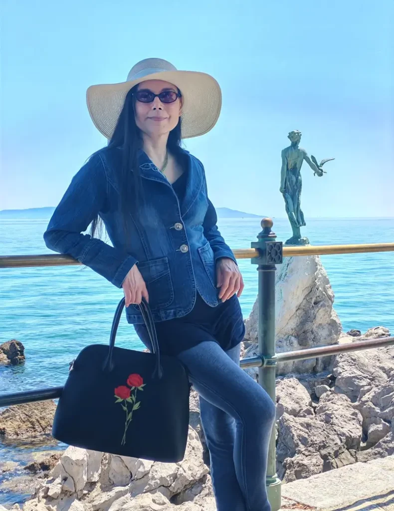 Danica Maricic with the Girl with the Seagull statue in Opatija, Archi-living.com