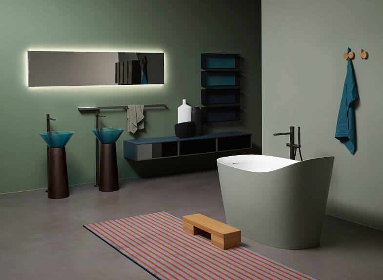 green designer bathtub,antonio lupi vasca mastello,green and brown bathroom sinks,two pedestal sinks in bathroom,bathroom wash basin colorful,
