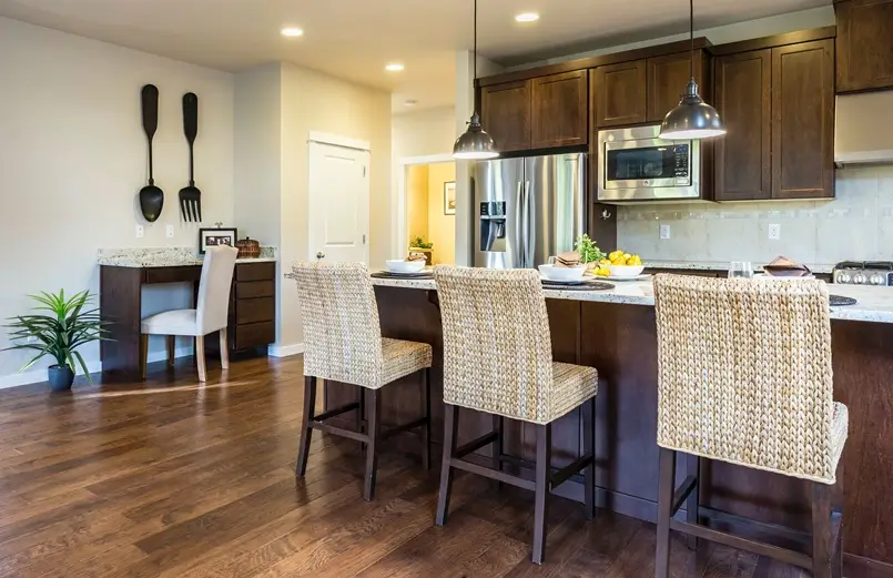 home staging ideas, wooden kitchen with bar and home office, photo by Francesca Tosolini on Unsplash, Archi-living.com