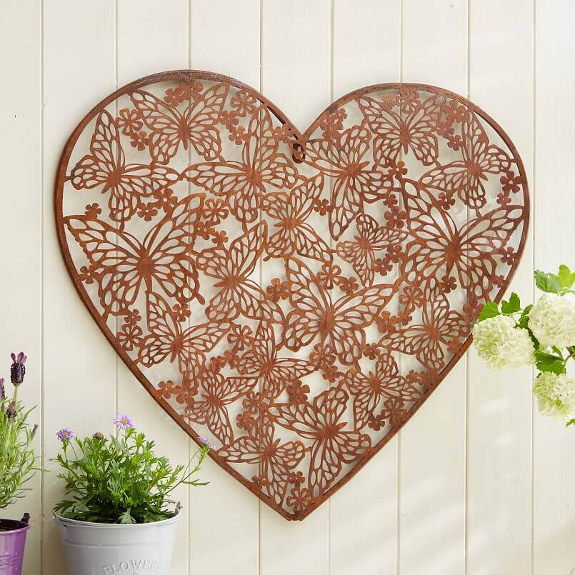 butterfly inspired decoration ideas,home decor in the form of hearts,wall hanging in heart shape,romantic bedroom decorating ideas,romantic bedroom wall decor ideas,